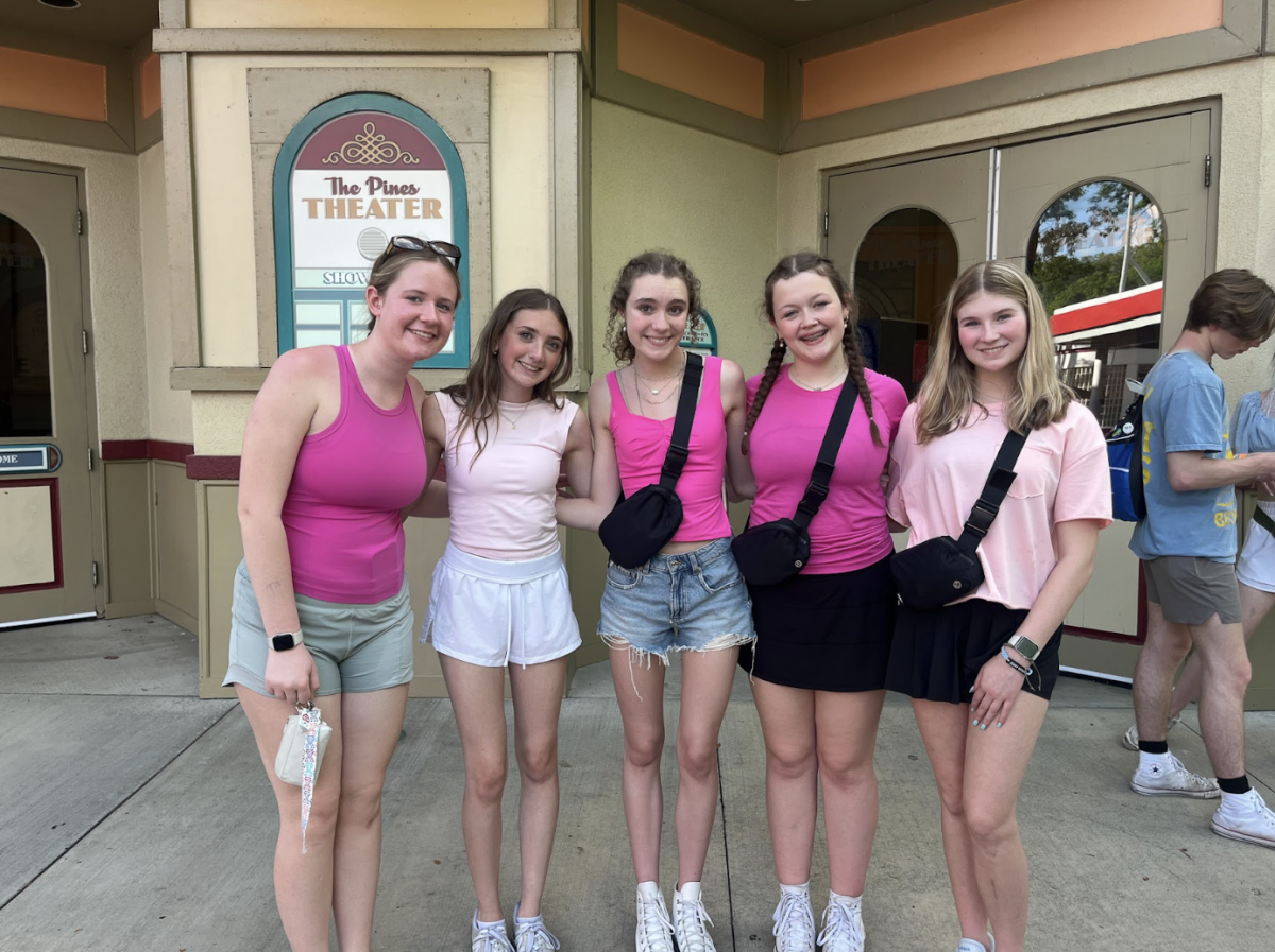 Caroline Eagen (10), Katherine Heilman (9), Mya Lipniskis (9), Kit Valentine (9), and Madeline Banocy (9) wait for the award ceremony to open the doors. “I loved how close our choir got together, and all the fun memories we all made,” Eagen said.